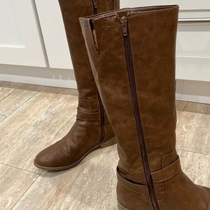 Tall brown Bass boots, made in USA. Barely worn except I cut only one elastic